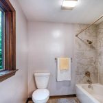 tile shower and toilet